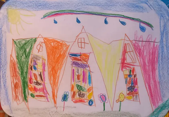 Kinderzeichnung: Häuser an einer Straße
