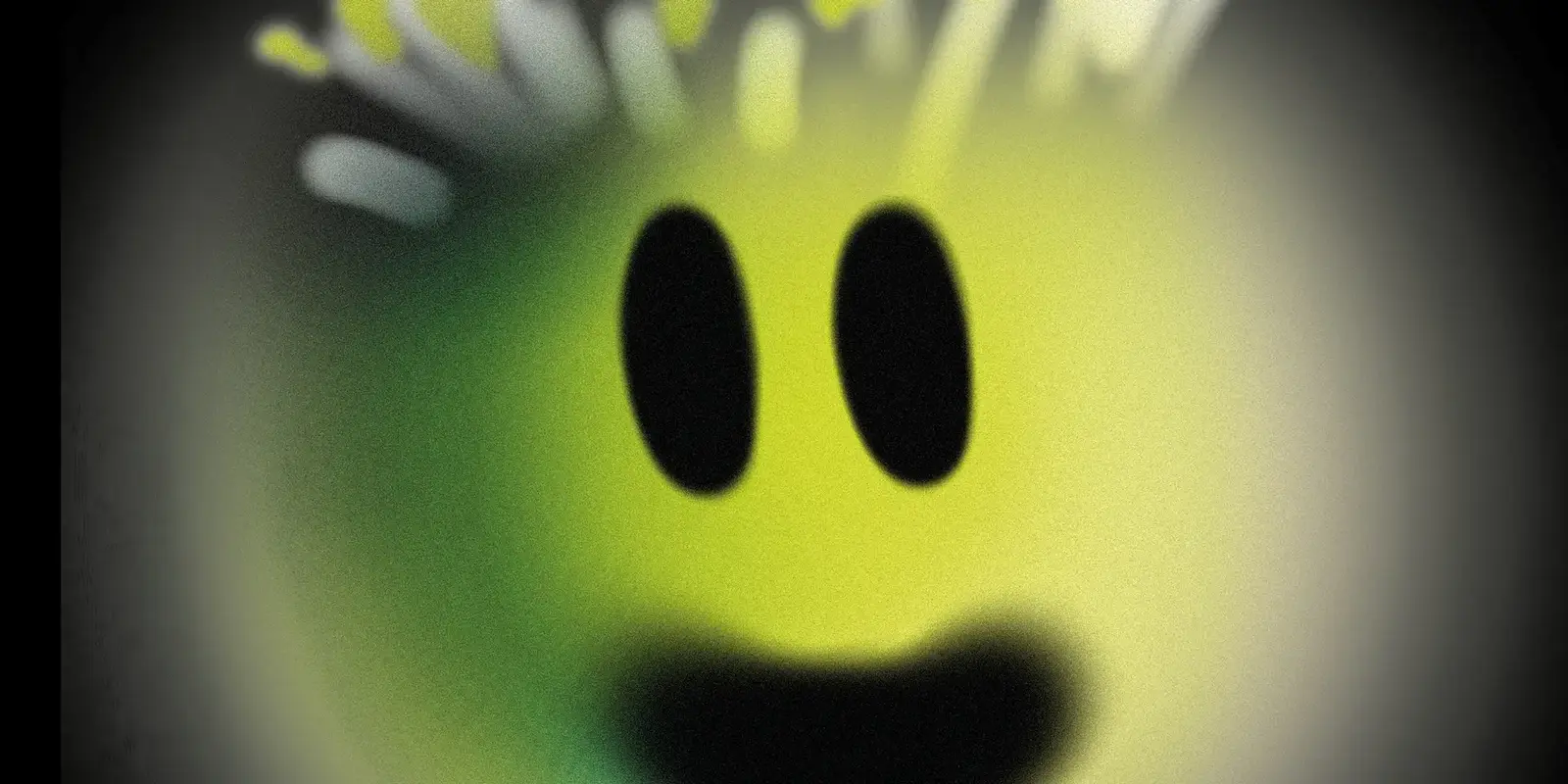 Ein verwaschener Smiley vor schwarzem Grund