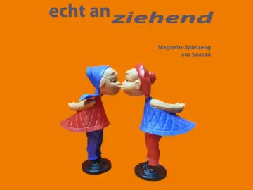 Magneto-Spielzeug: zwei sich küssende Puppen