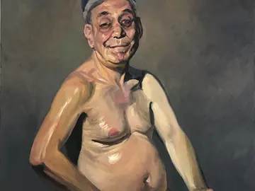 sitzender nackter Mann in Pose